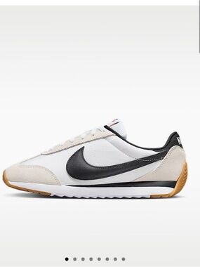 Nike White and Black Retro Runner with Gum Sole Pacific